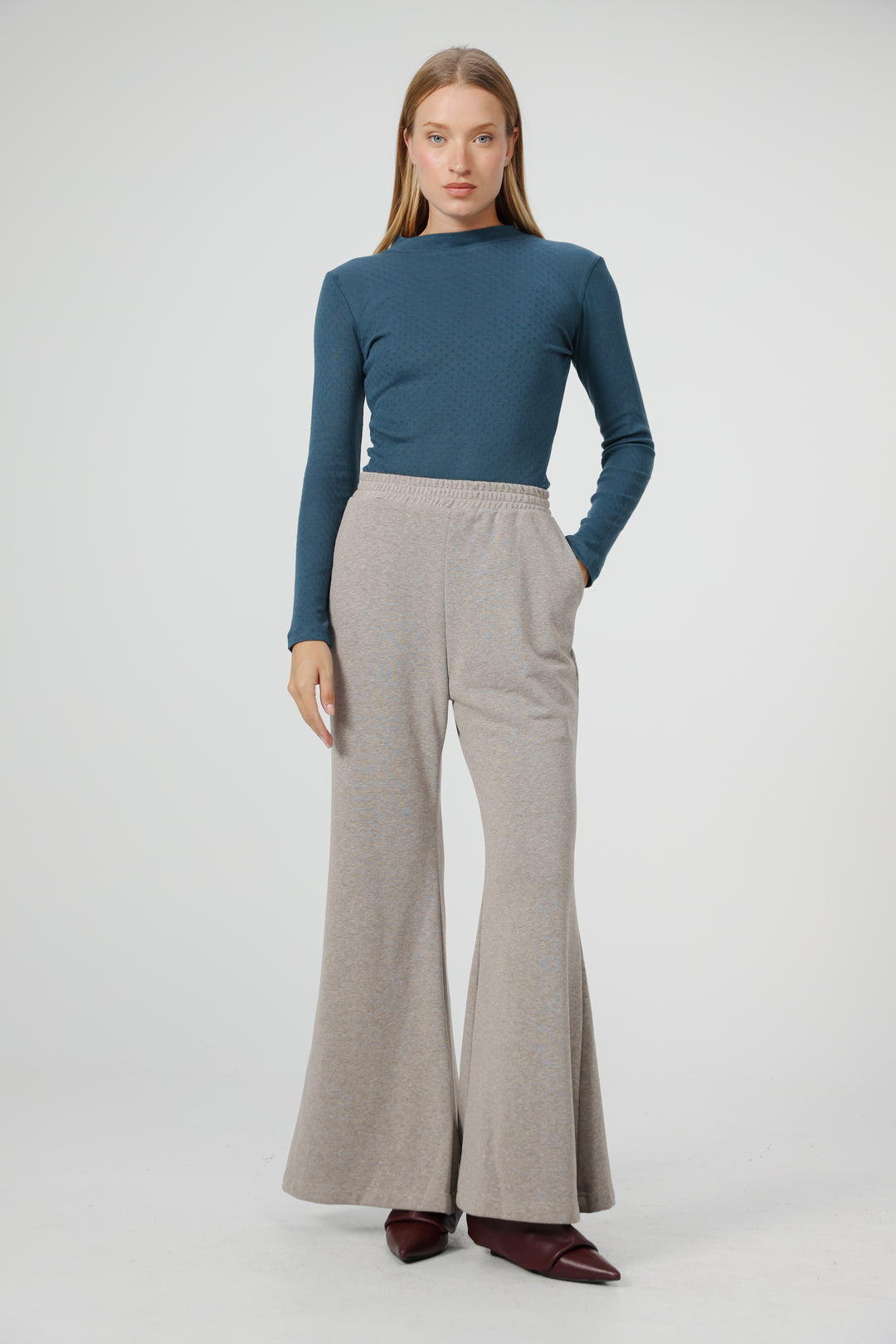 Search Teal Bodysuit