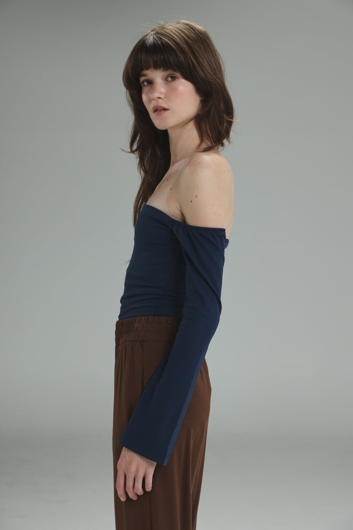 Navy lycra off shoulder top with a long draped sleeve shown from the front
