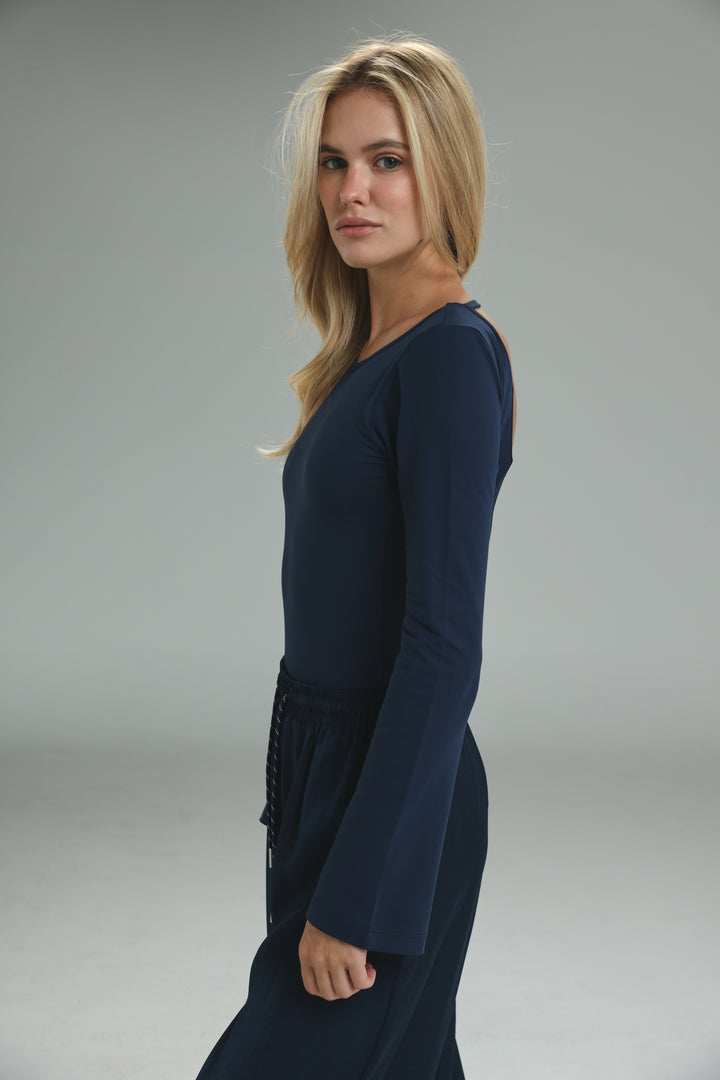 Navy blue long-sleeved dress with flared cuffs and drawstring waistband shown from the front