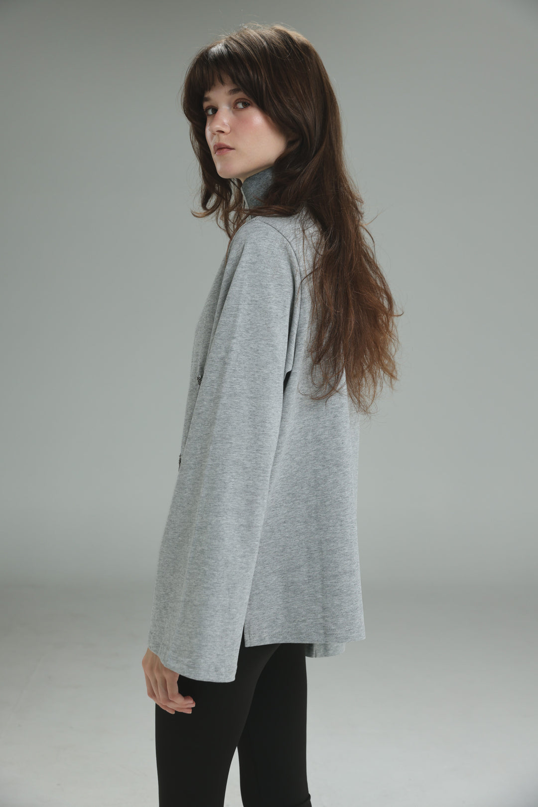 Joy grey polo soft heather gray long-sleeved turtleneck top with relaxed fit and subtle texture shown from the front