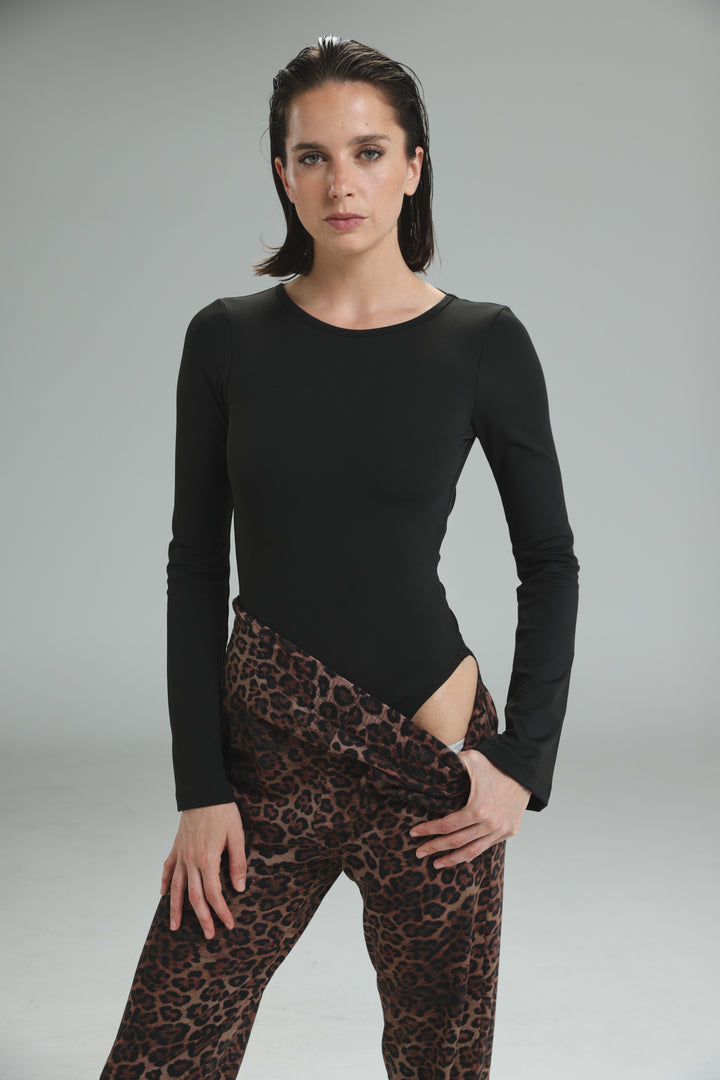 Black long-sleeved lycra bodysuit with high neckline side slit and open back shown from front angle