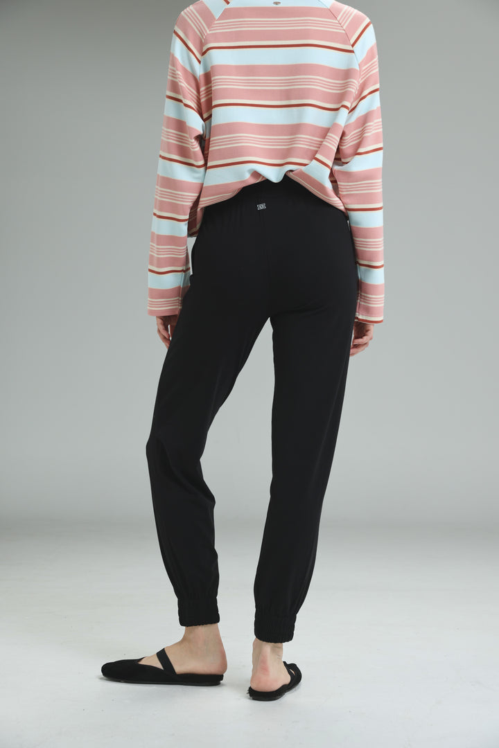 Bestie black joggers with sleek form-fitting design and elastic cuffs shown from the front