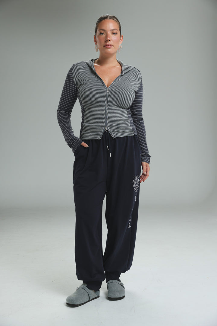 Zip up brown stripes hoodie with black and gray stripes, long sleeves, drawstring hood, and relaxed fit shown from the front