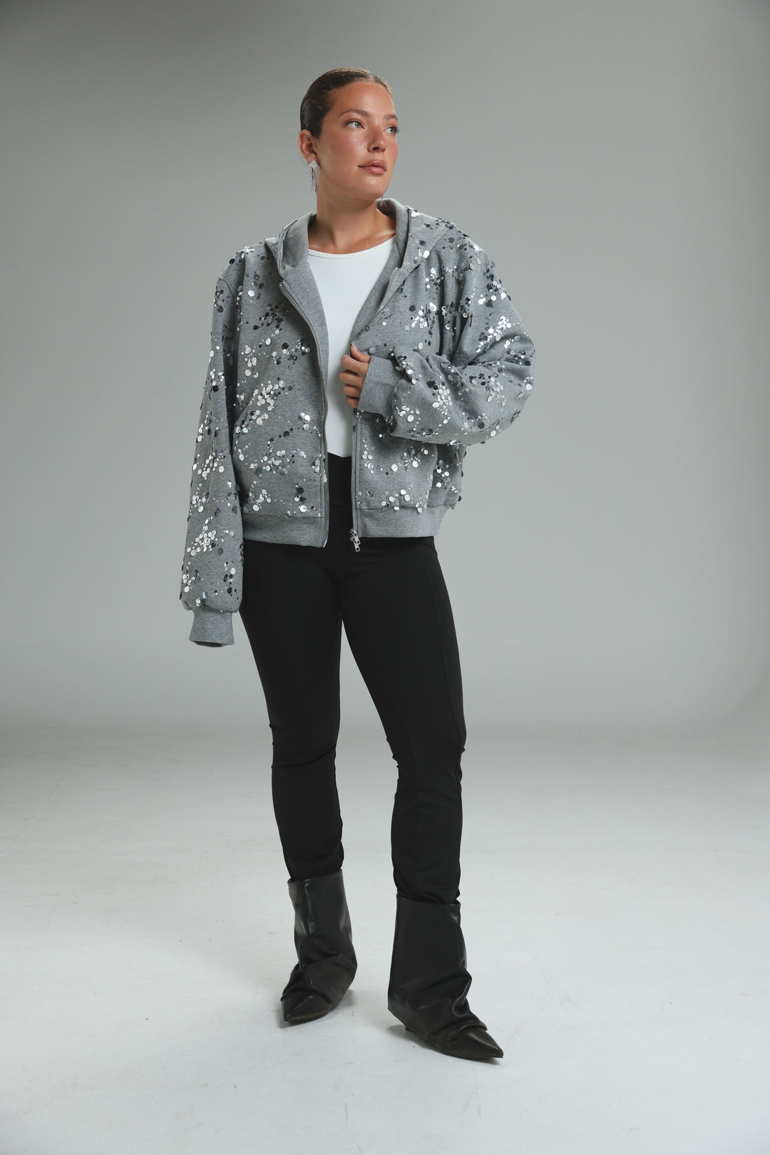 Fortune grey jacket showing front view of gray sequined bomber jacket with hood and front zipper
