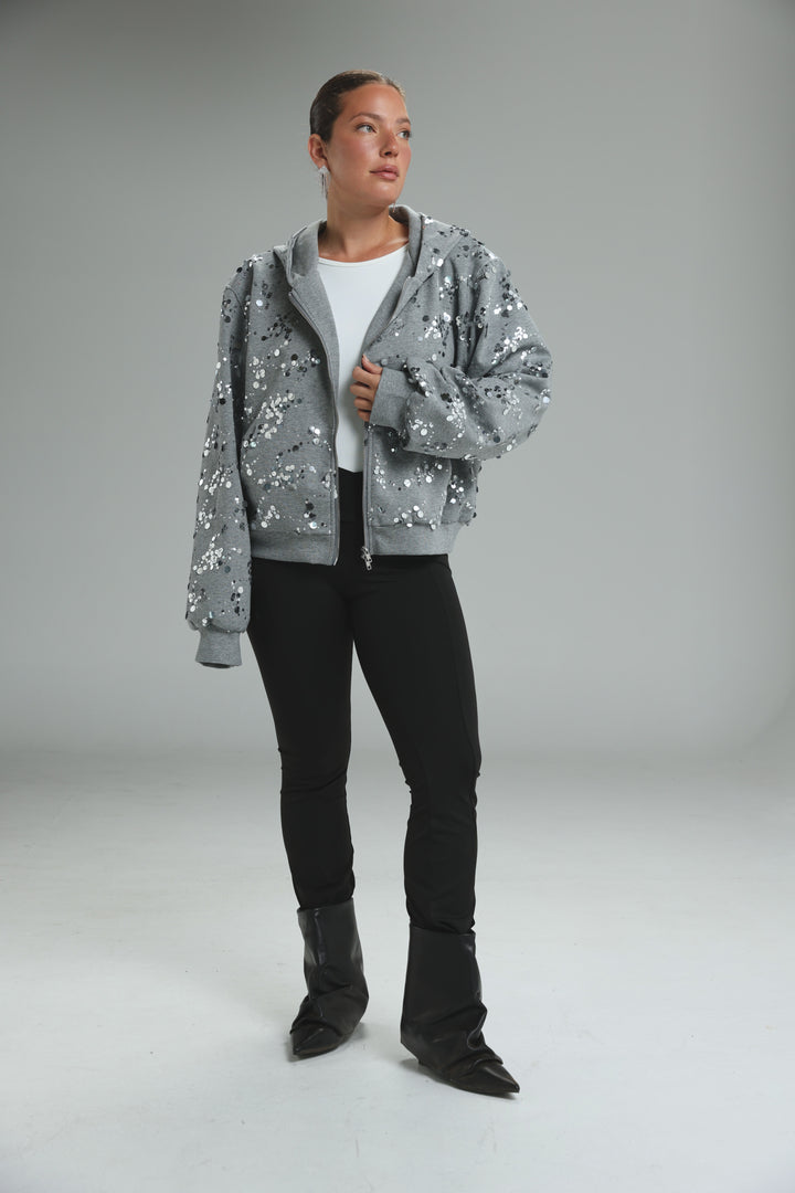 Fortune grey jacket showing front view of gray sequined bomber jacket with hood and front zipper