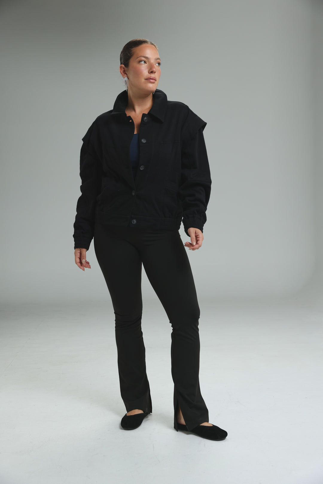 Black oversized Puzzle Wine jacket with structured shoulders and button closures shown from the front