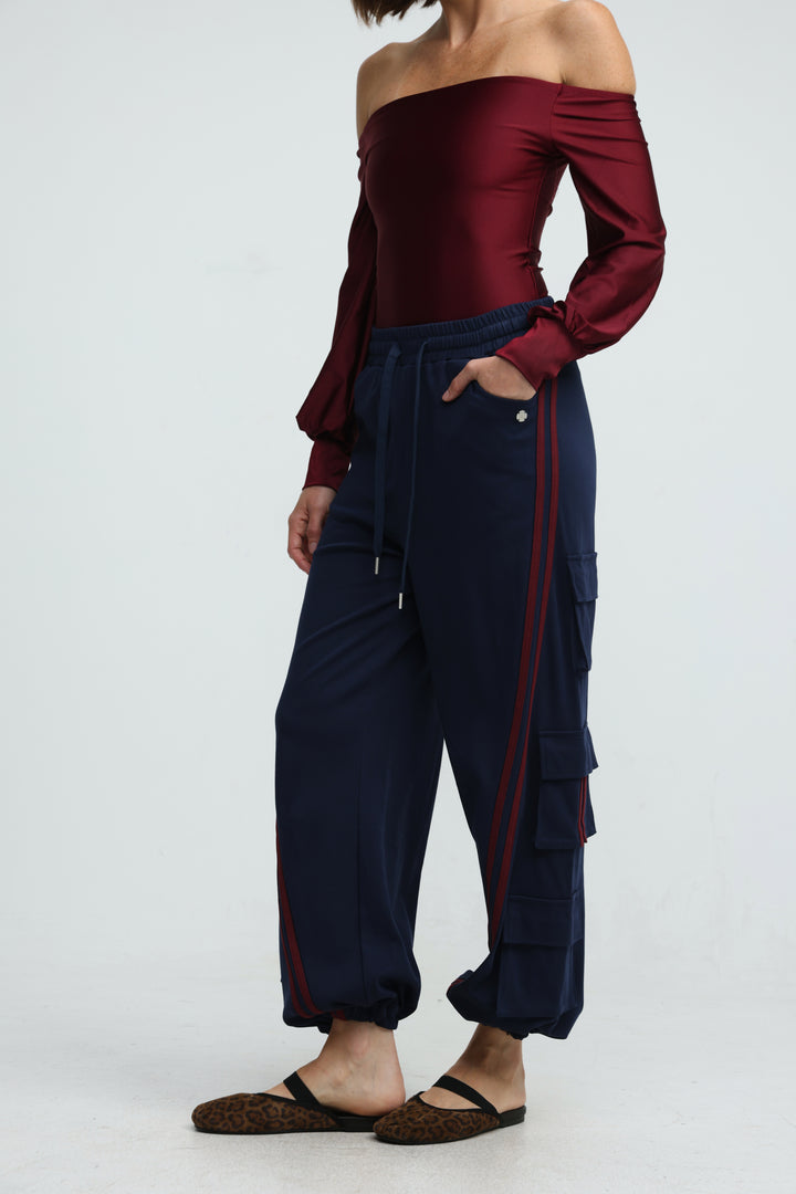 Navy blue cargo joggers with maroon side stripes and drawstring waistband shown from front view