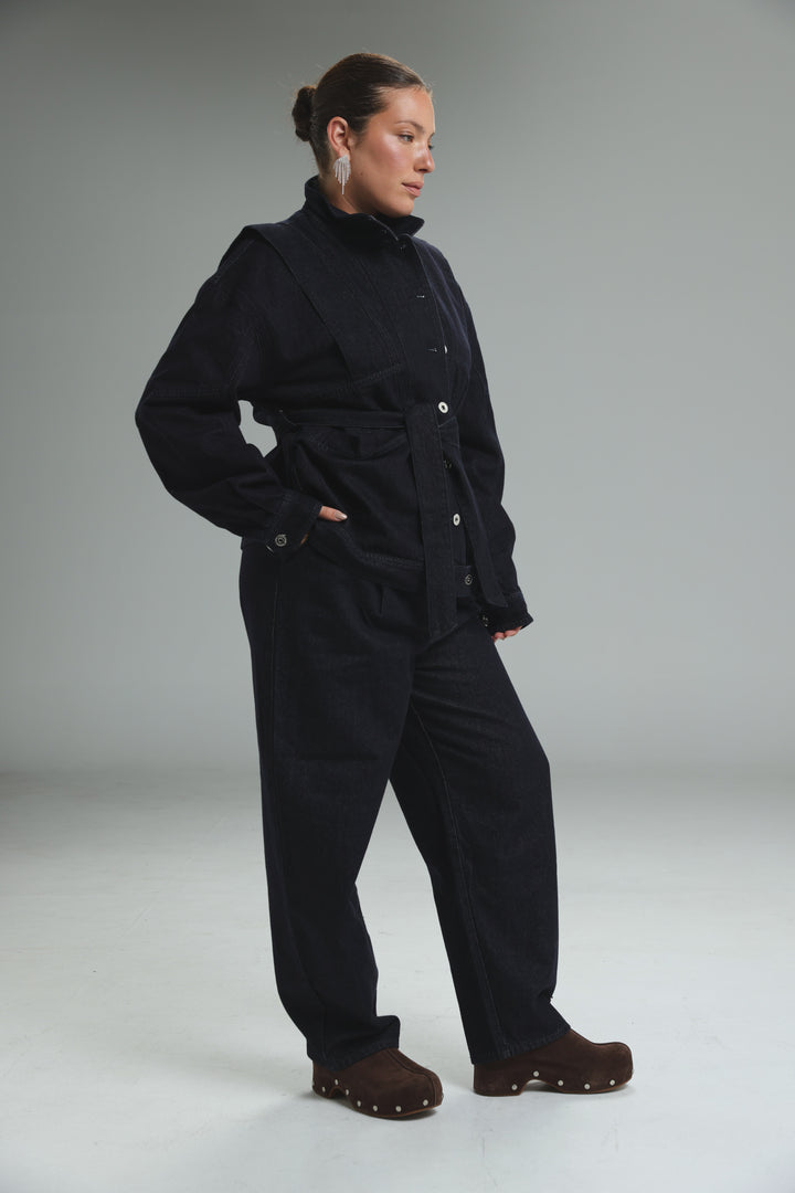Prestige dark blue denim jacket shown from front with button closures and relaxed fit