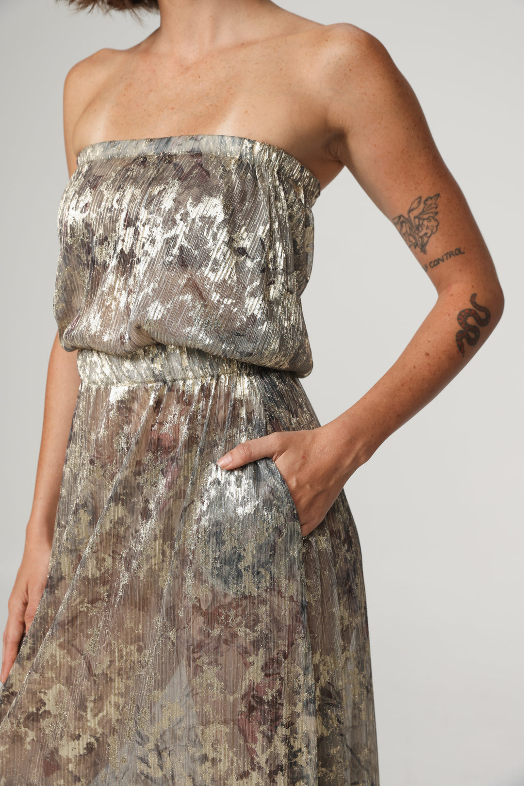 Her Silver Strapless Dress