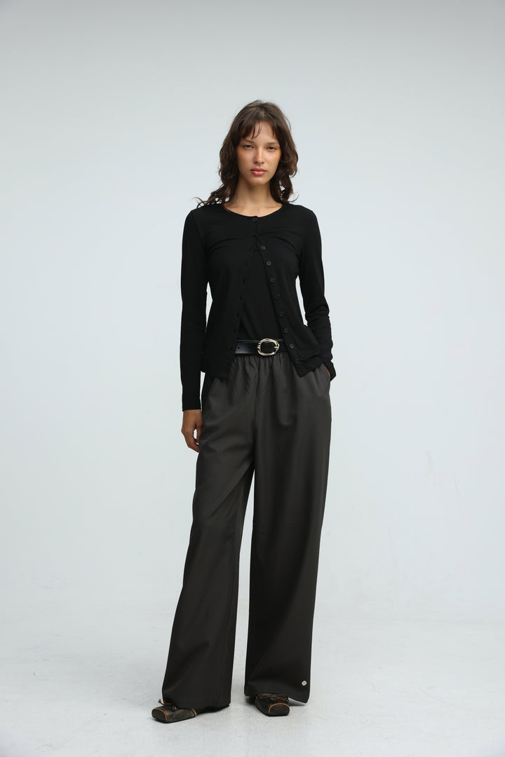 Black layered tank cardigan with long sleeves button-up front subtle textured knit and asymmetrical hemline front view