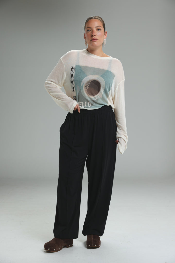 White long-sleeved hello coffee cream shirt with light blue circular graphic and hello text on front