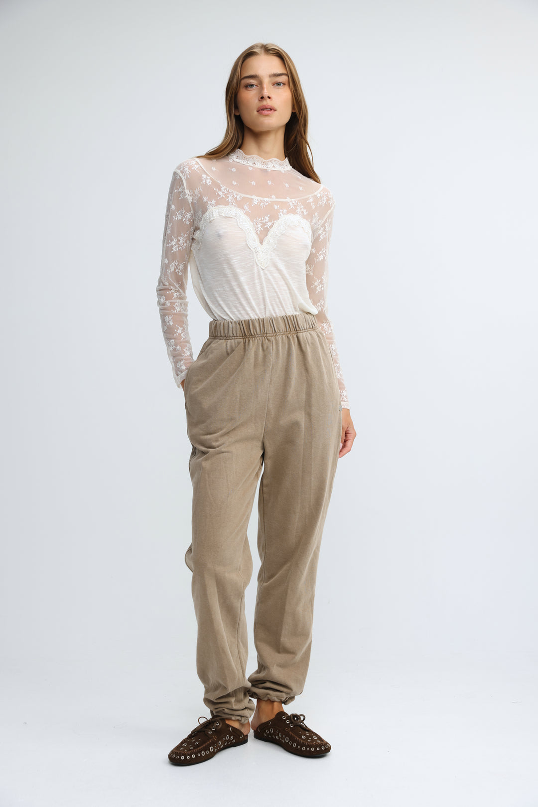 Zone camel joggers in beige corduroy with elastic waistband and cuffed hems shown from the front view