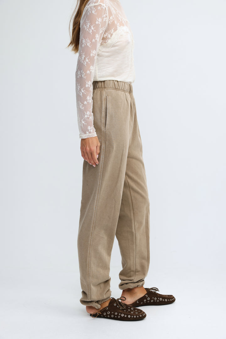 Beige cotton Zone Camel joggers with elastic waistband and cuffed hems shown from the front