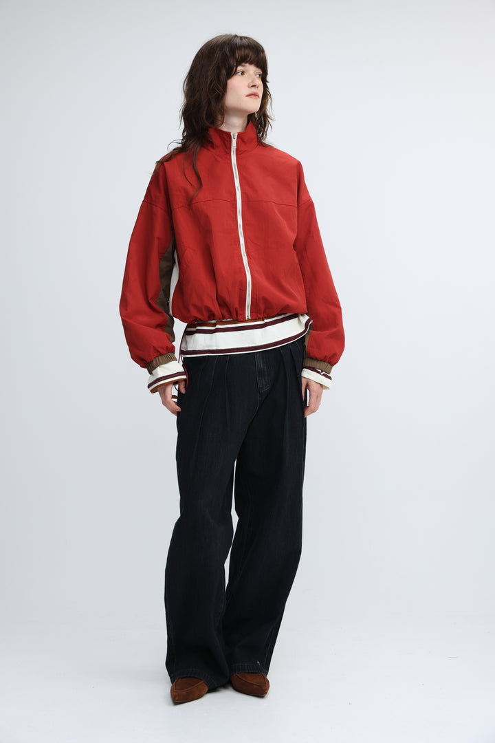Madas red bomber jacket with white and brown striped trim shown from the front