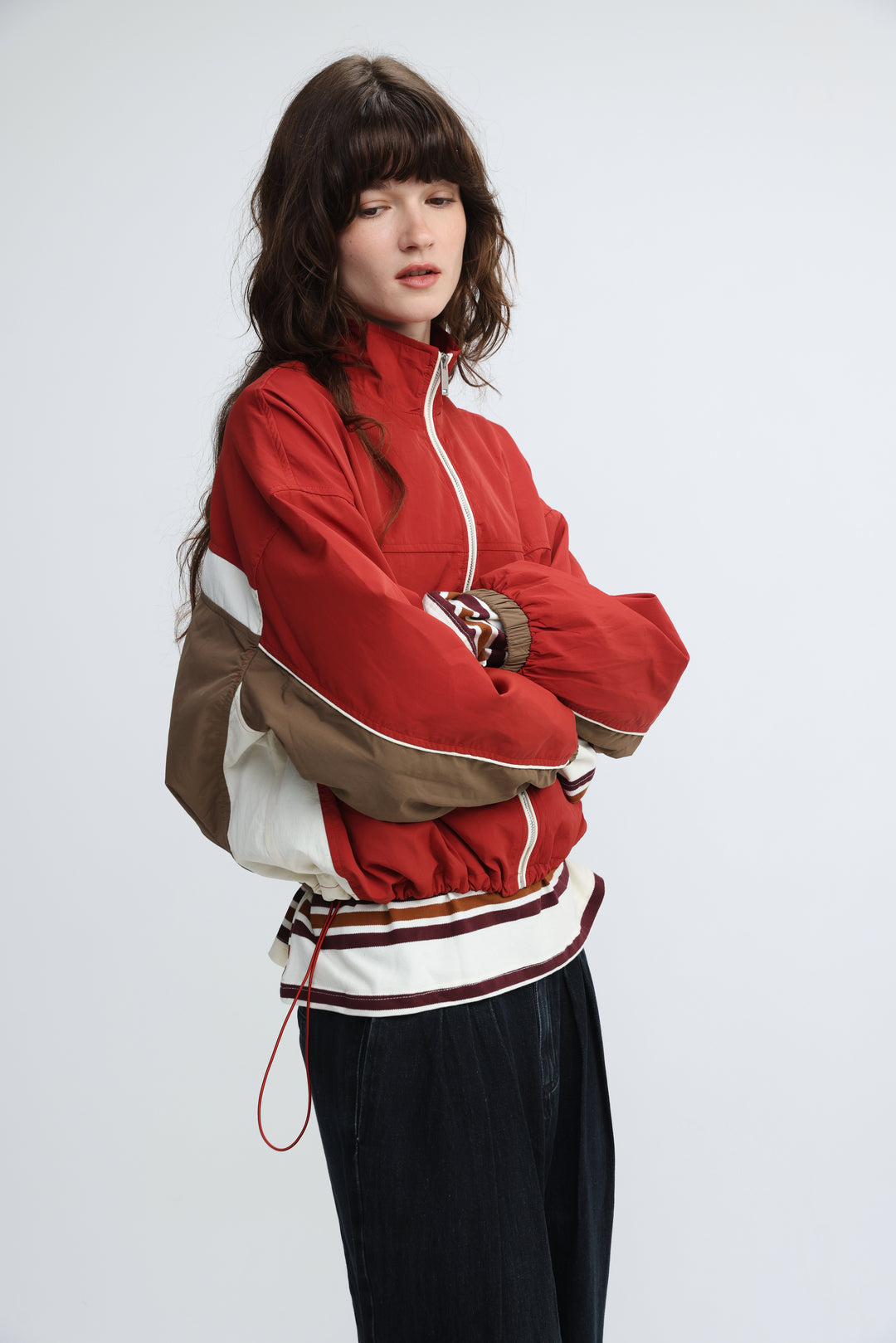 Madas red bomber jacket in red and beige color-block with white piping details shown from the front