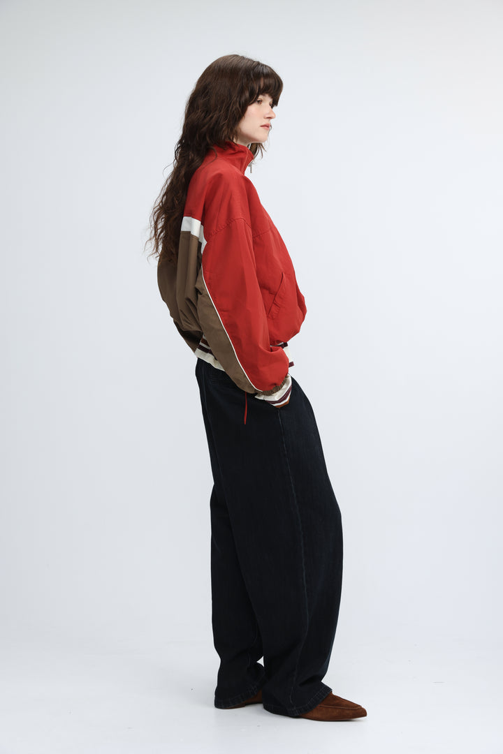 Madas red jacket featuring red and brown color-blocked track jacket with white trim shown from the front