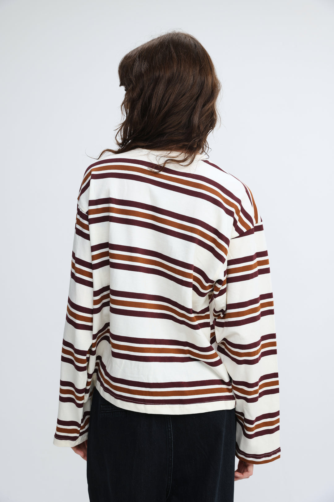 Cream long-sleeved shirt with horizontal maroon and burnt orange stripes shown from the front