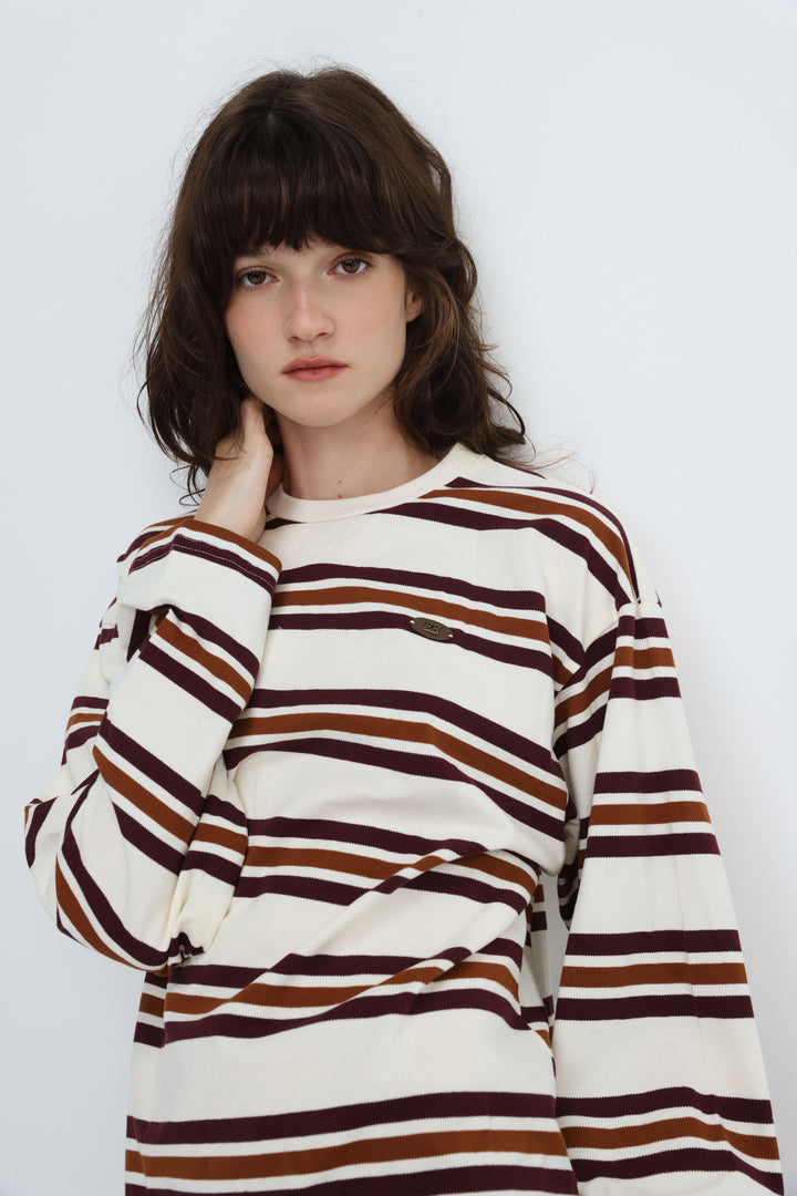Federer cream long-sleeved striped sweater with brown and maroon hues and a subtle chest brand patch front view