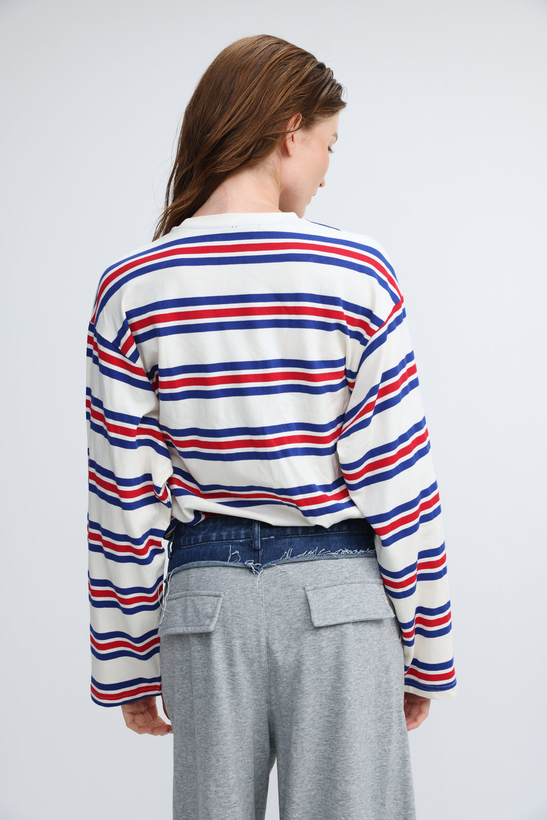 A long-sleeved cropped Federer blue striped shirt with bold red and blue horizontal stripes on a white base front view