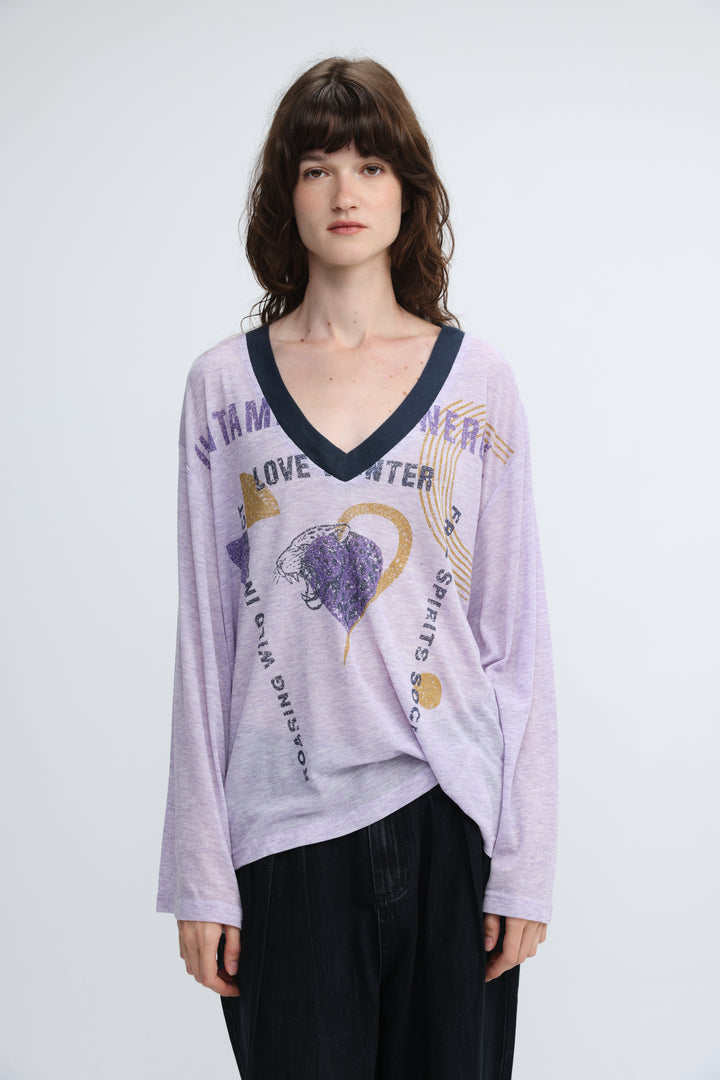 Lavender jungle purple v long-sleeved top with dark blue trim, graphic text, gold accents, and purple glittery heart front view