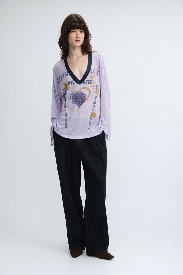 Lavender long-sleeved v-neck top with navy trim and graphic print front in jungle purple v shirt design