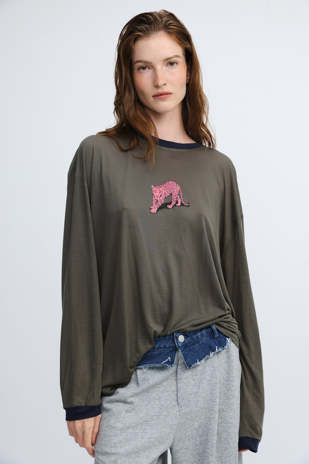 Pink tiger grey shirt with olive green long sleeves, pink sequined leopard embroidery, and navy blue ribbed cuffs and neckline