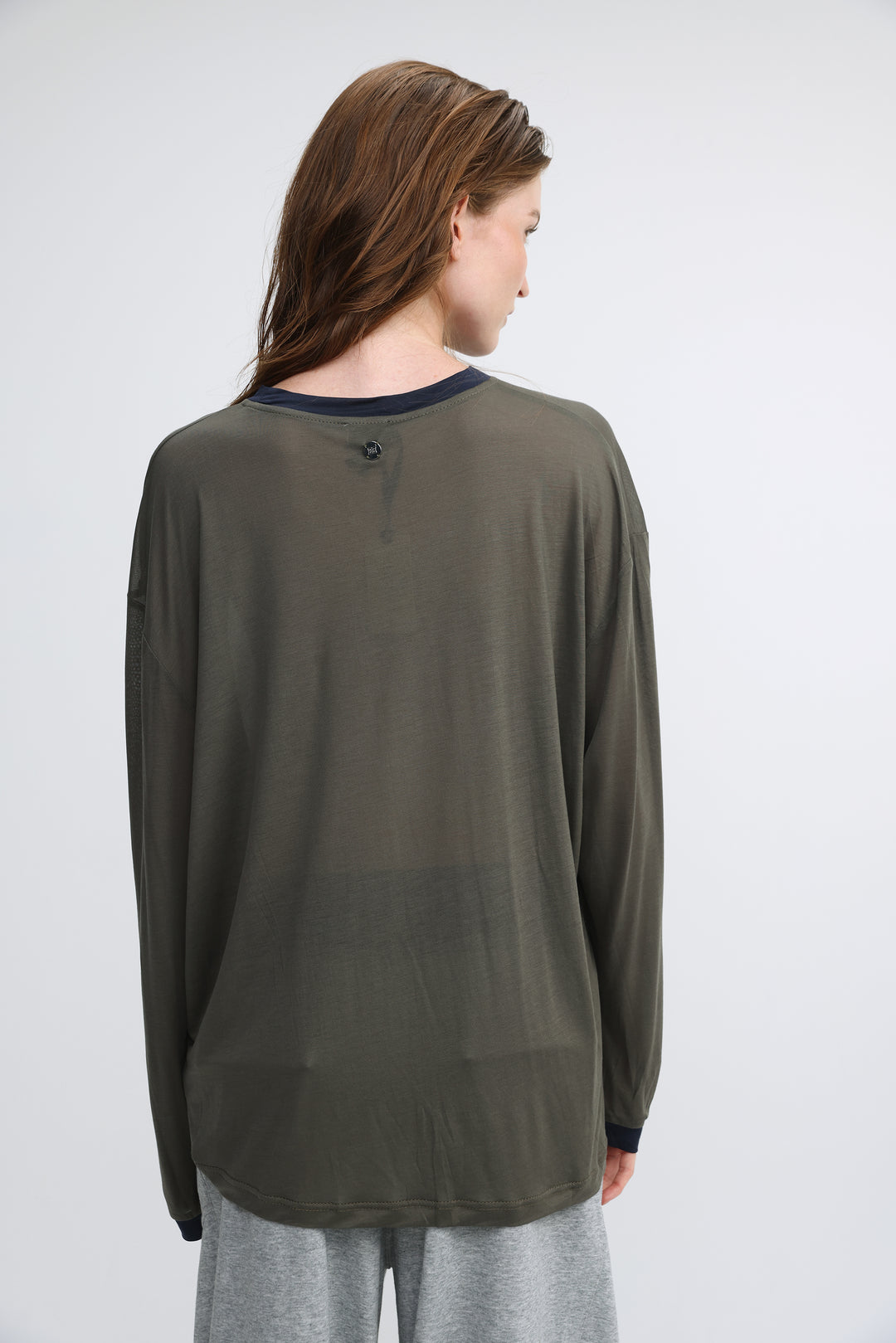 Pink tiger grey shirt with olive green long sleeves and navy blue ribbed neckline and cuffs, front view