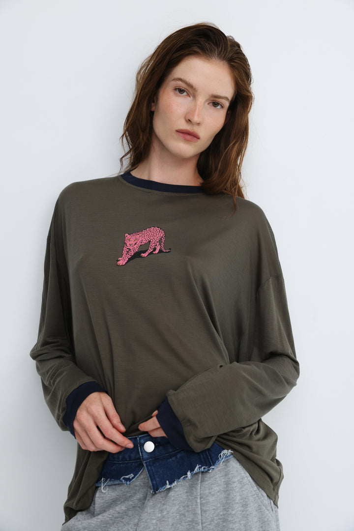 Pink tiger grey shirt with olive green long sleeves, pink leopard embroidery on chest, and navy ribbed crew neck and cuffs