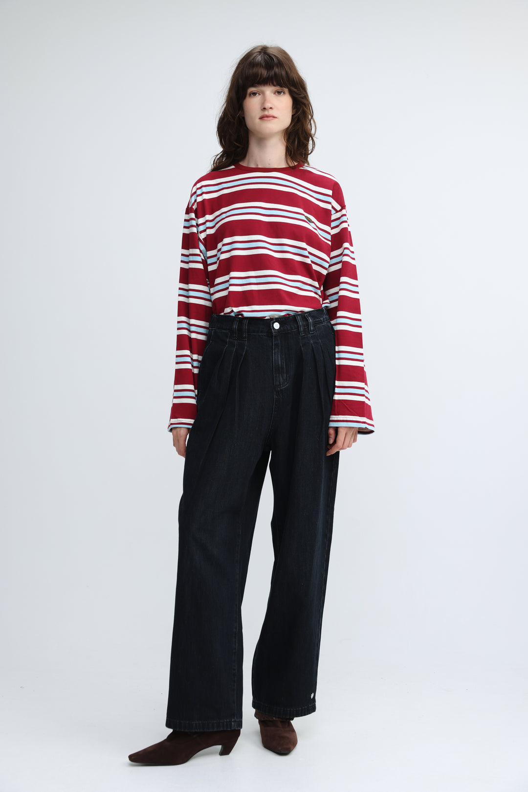 Red and white horizontally striped long-sleeved top with round neckline shown from the front