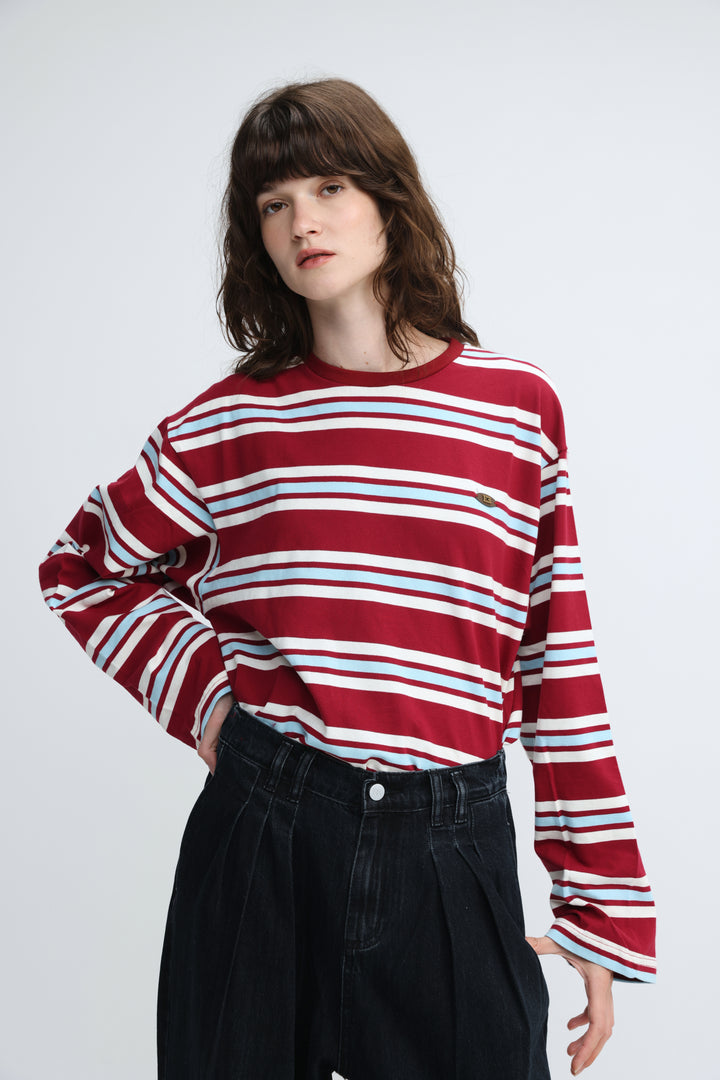 Red and white striped long-sleeve tee with light blue accent stripes shown from the front