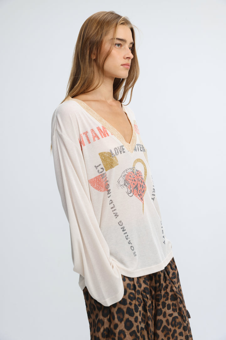 White long-sleeved v-neck jungle cream v shirt with tiger graphic and text print on the front