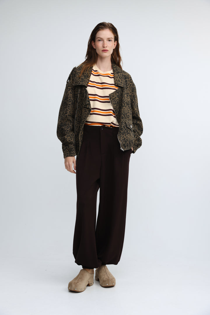 Dark green leopard-print jacket with relaxed fit and frayed cuffs shown from the front