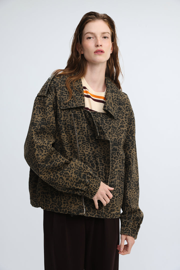 Olive green leopard print denim jacket with relaxed fit and rolled cuffs shown from front view