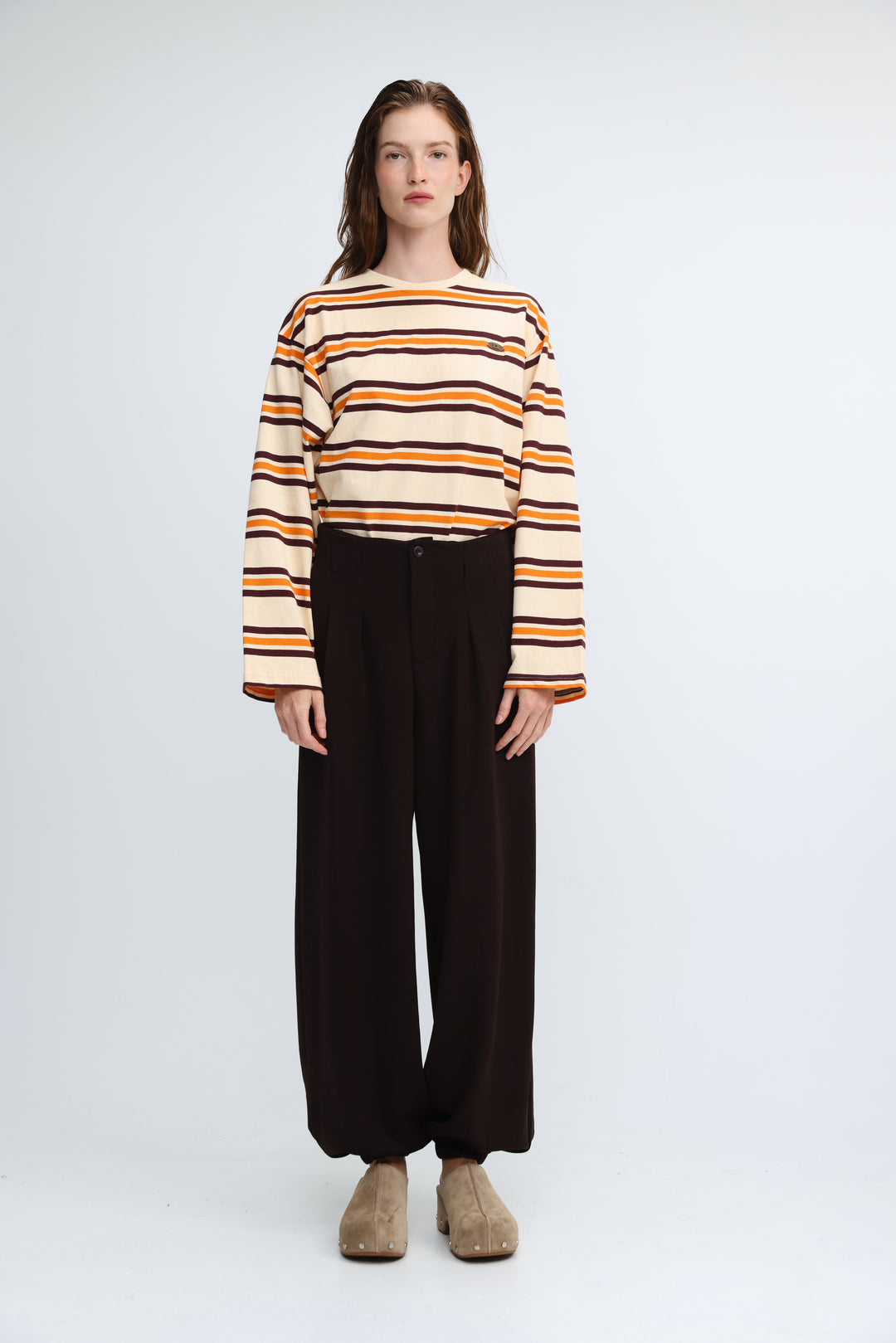 Long-sleeved Federer orange striped shirt with horizontal cream, orange, and dark brown stripes shown from the front