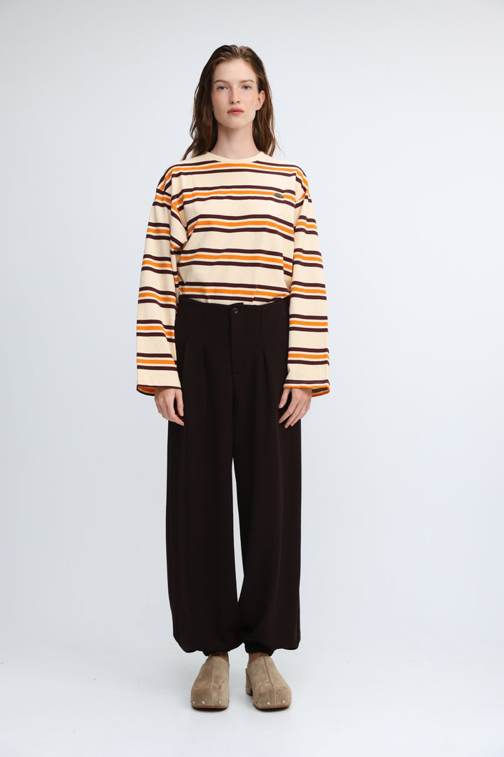 Long-sleeved Federer orange striped shirt with horizontal cream, orange, and dark brown stripes shown from the front