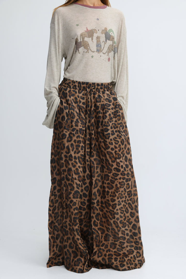 A flowing wide-leg skirt in earthy brown and black leopard print shown from the front
