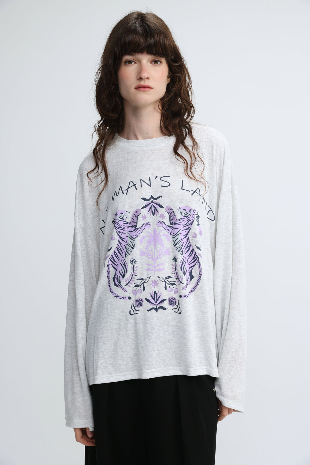 NML grey long-sleeved tee with a bold purple and black graphic of two tigers facing each other and mans land text above