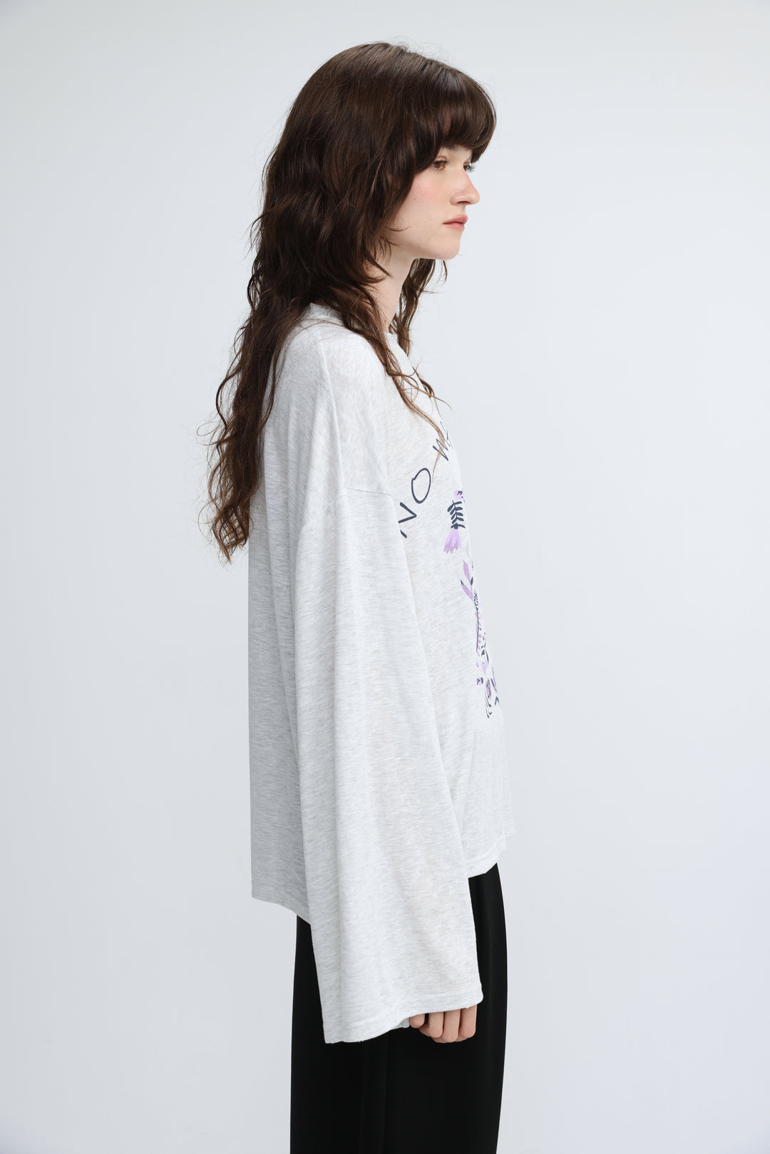 NML grey shirt heather gray long-sleeved t-shirt with subtle floral and text graphic on the side