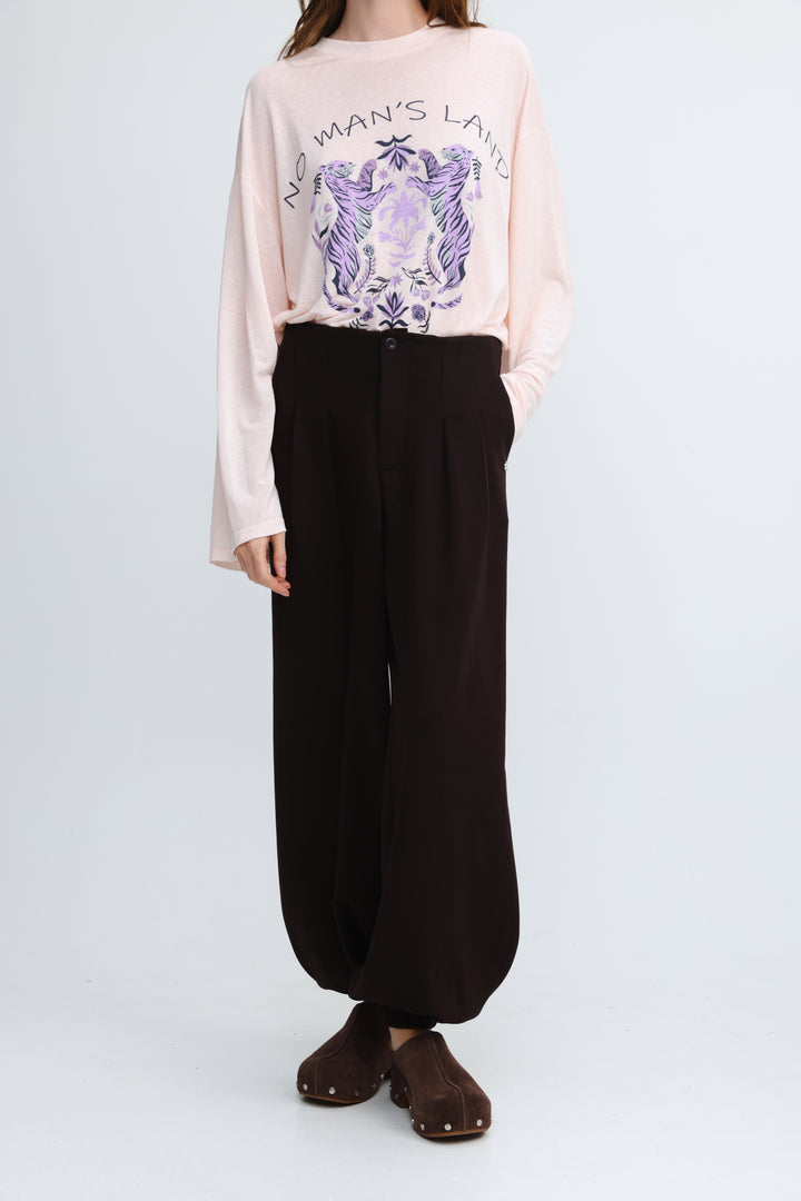 Pink long-sleeved sweatshirt with bold purple and black tiger graphic above no mans land text front view