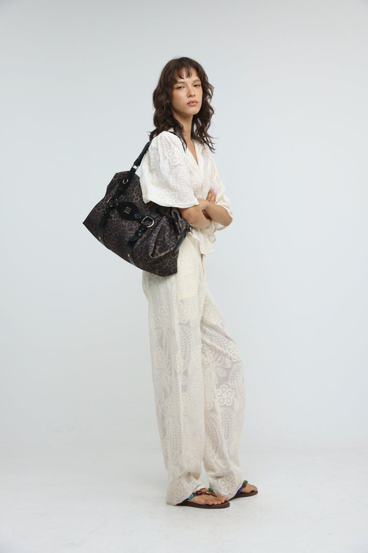 Relocation Leopard Bag