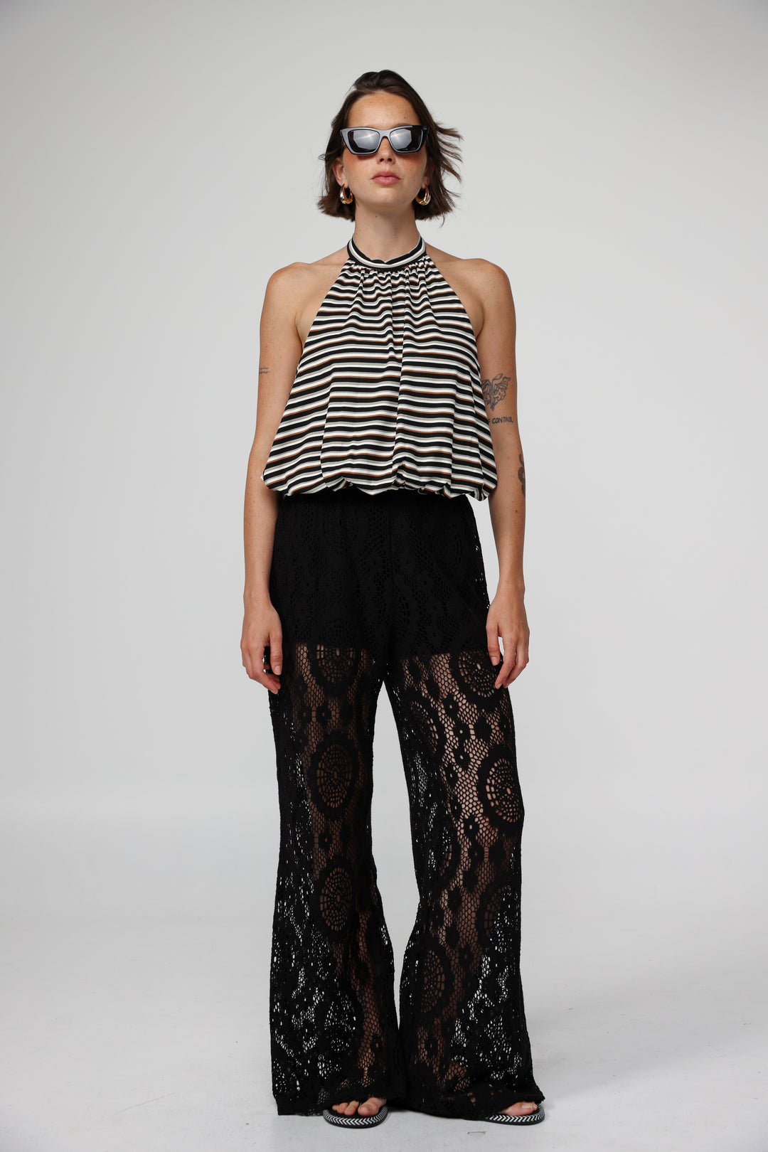 Explain Black Stripes Tank