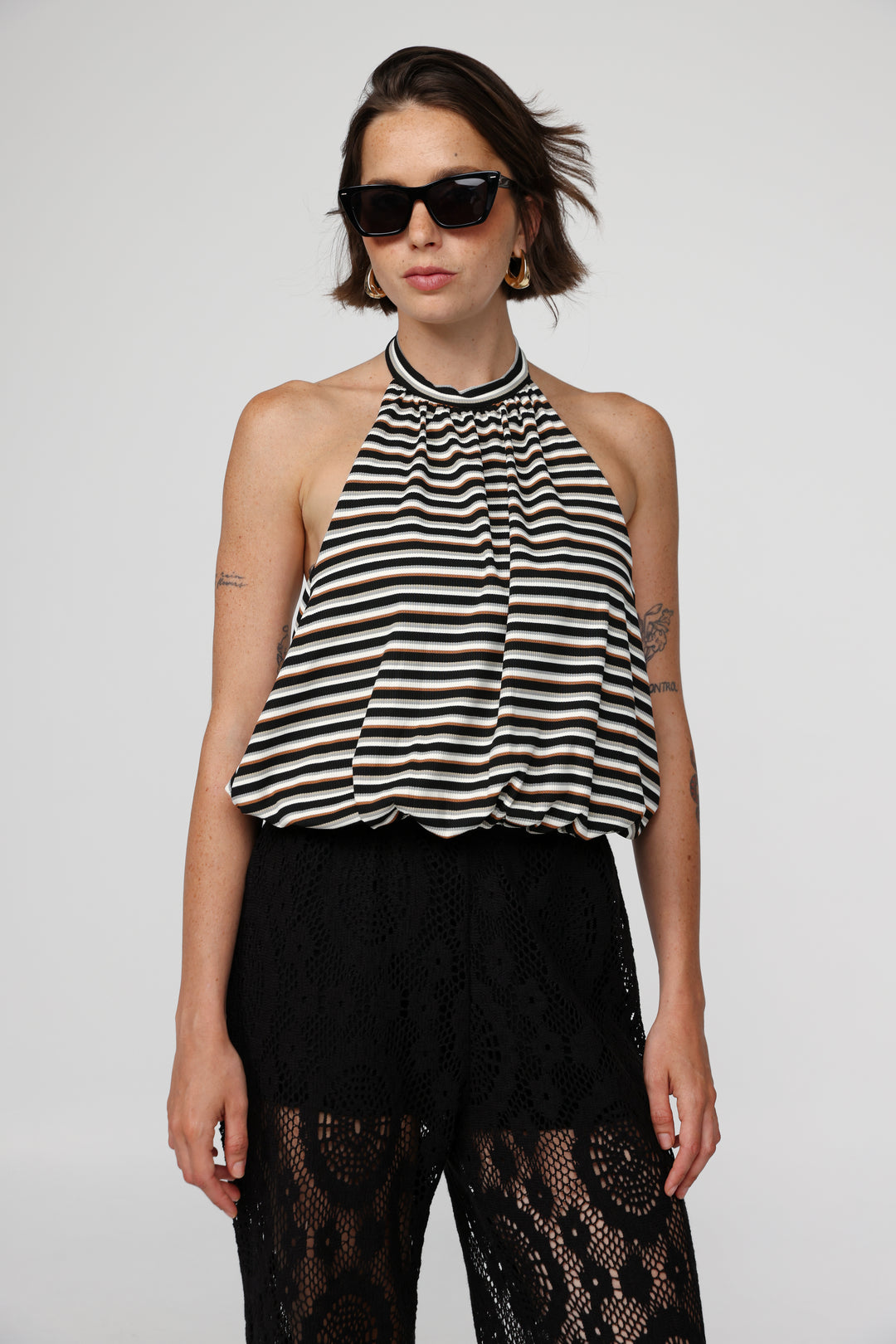 Explain Black Stripes Tank