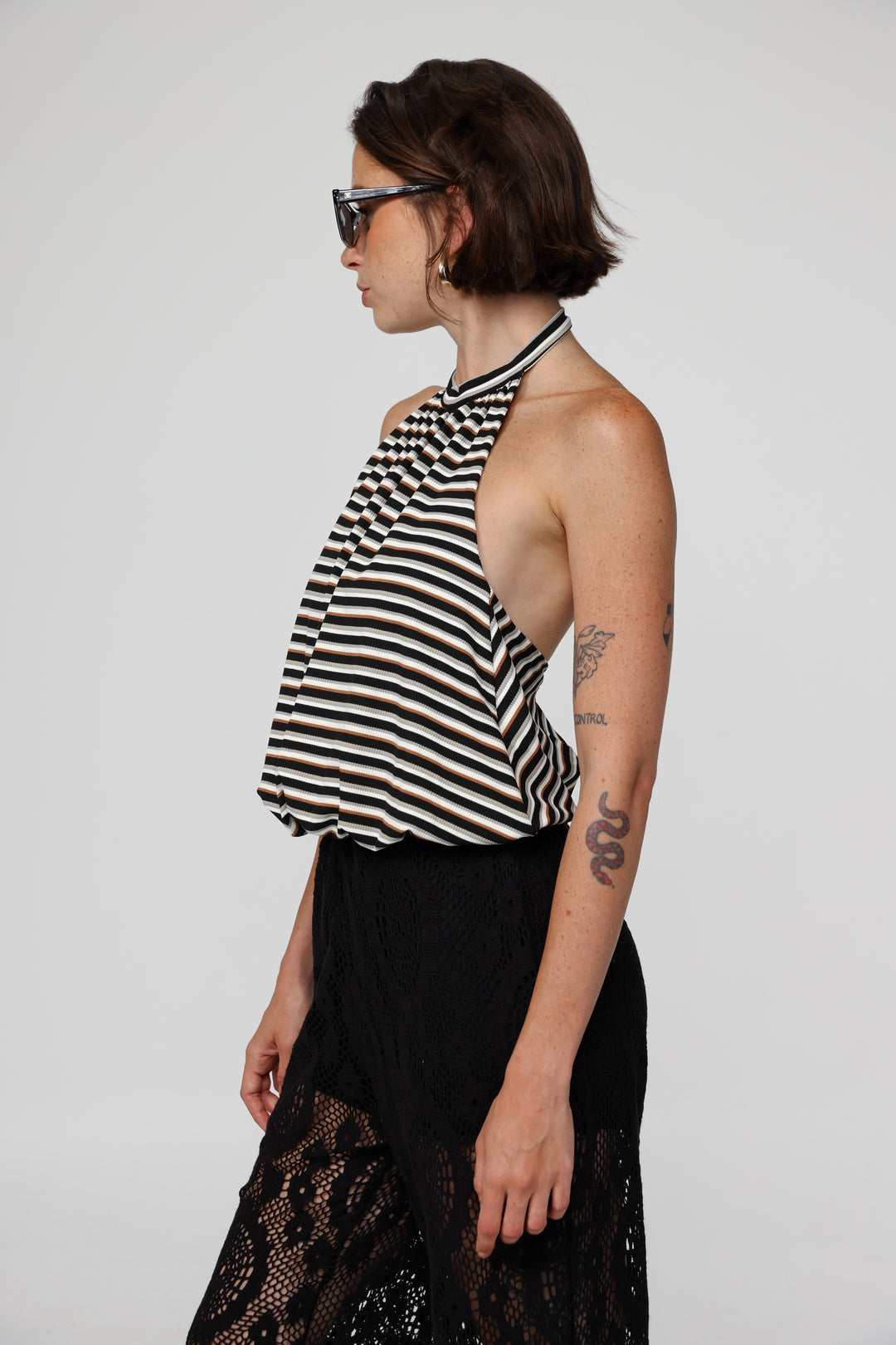 Explain Black Stripes Tank