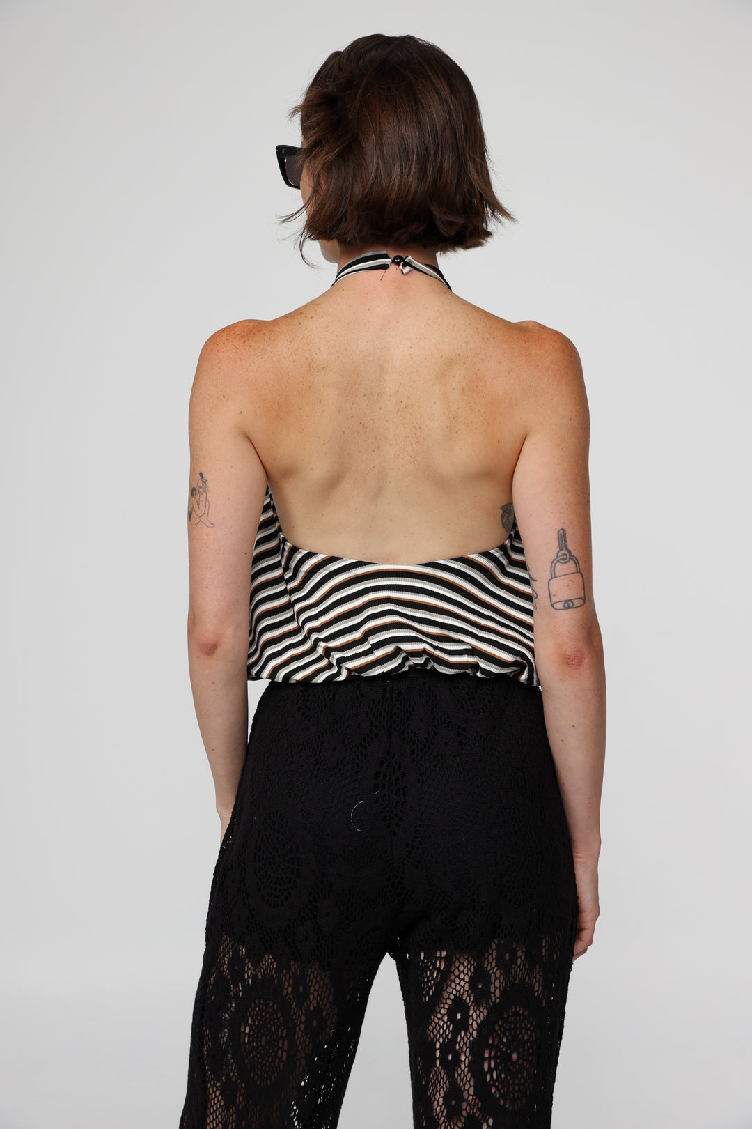 Explain Black Stripes Tank
