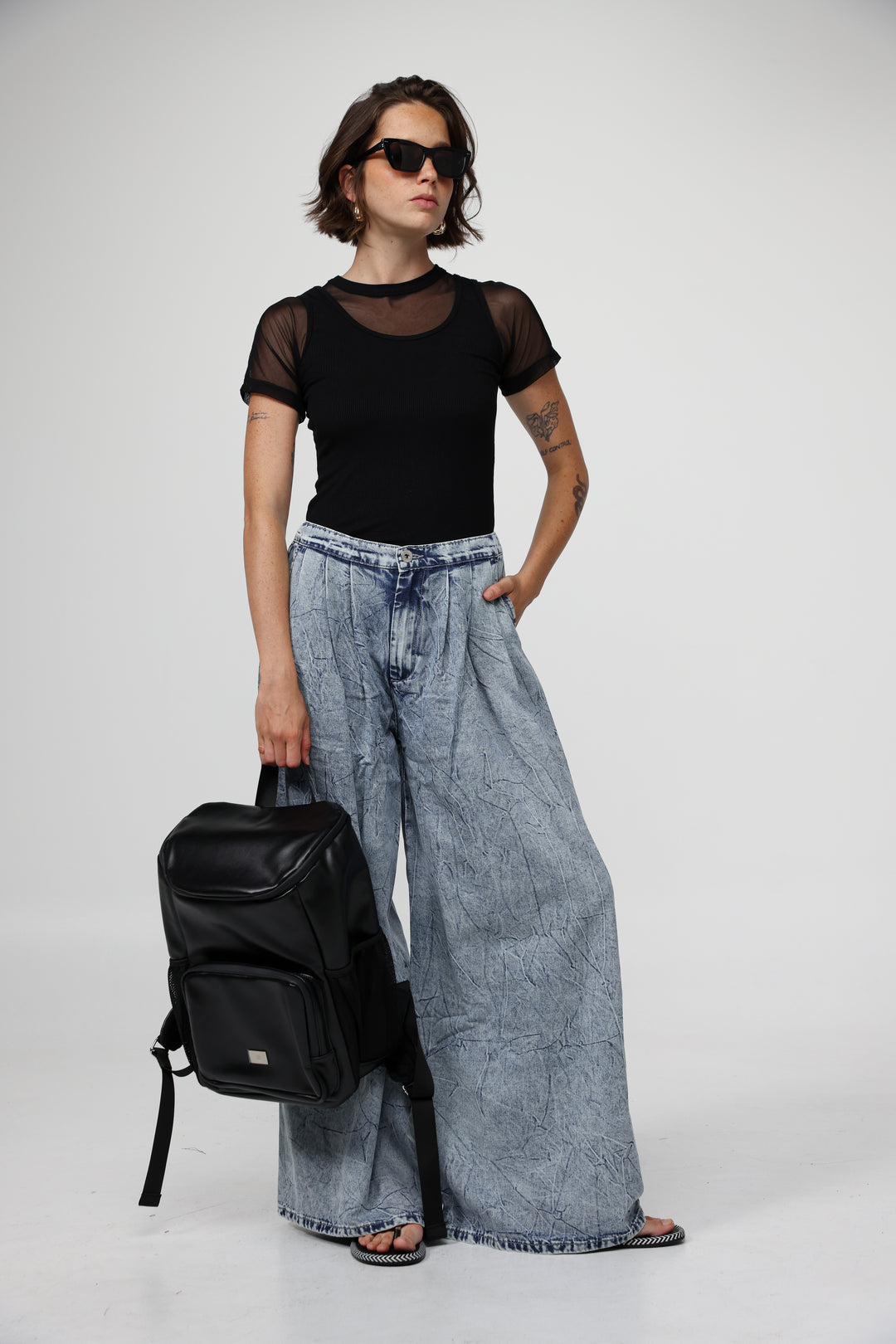 תיק עור שחור עם ידית Black Leather Backpack