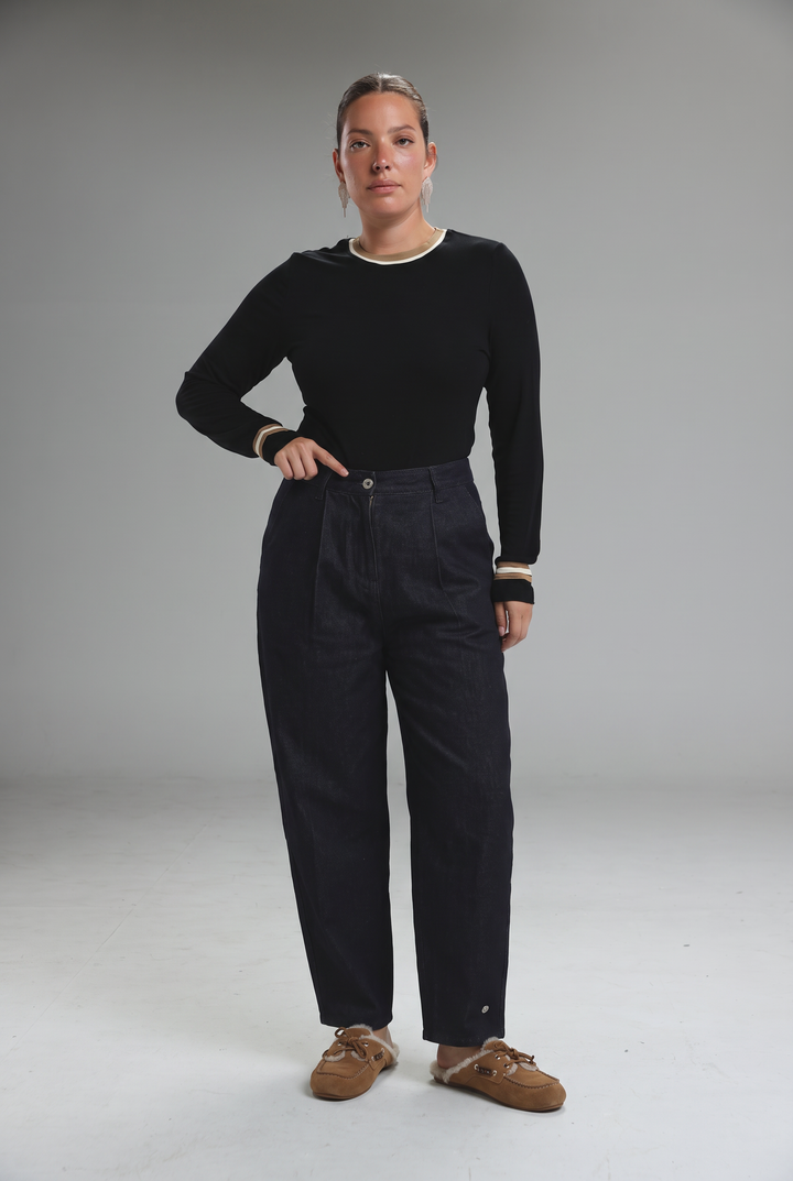 Black high-waisted trousers with relaxed fit and subtle pleats shown from the front under Star 250 light blue tailored denim