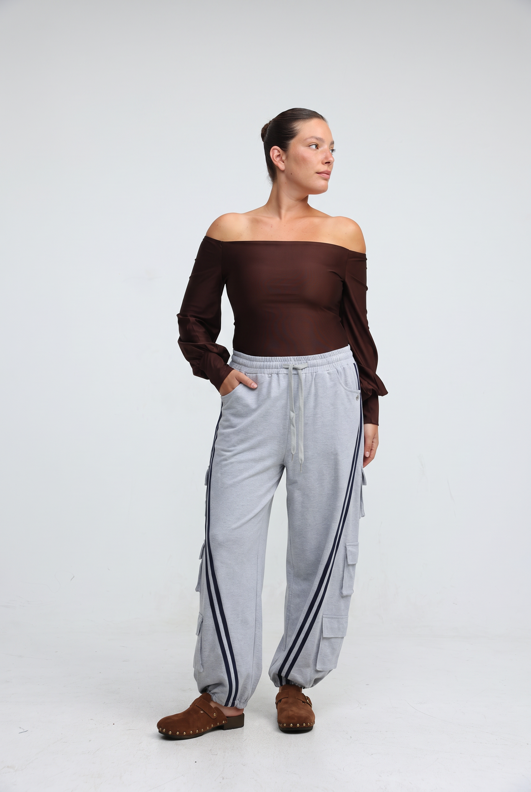 Port black joggers light gray cargo pants with navy blue side stripes and multiple front and side pockets viewed from front