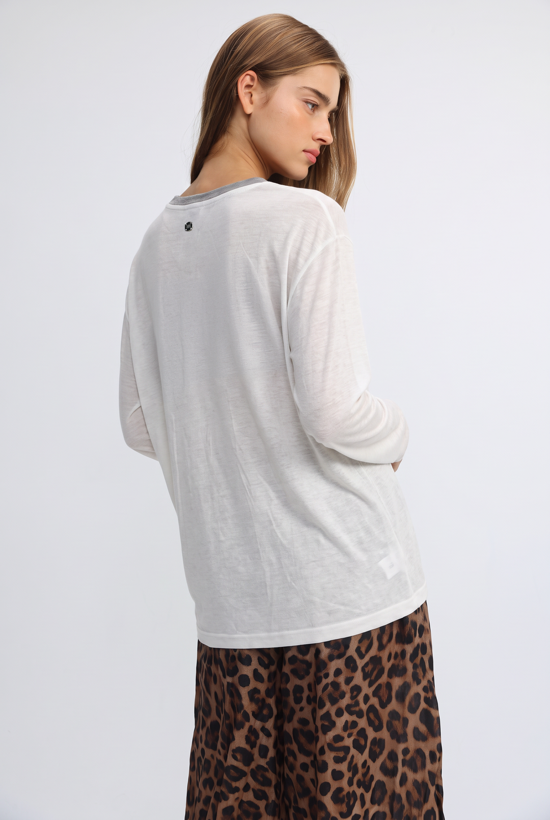 Jungle cream shirt white long-sleeved top with subtle gray trim around the neckline front view