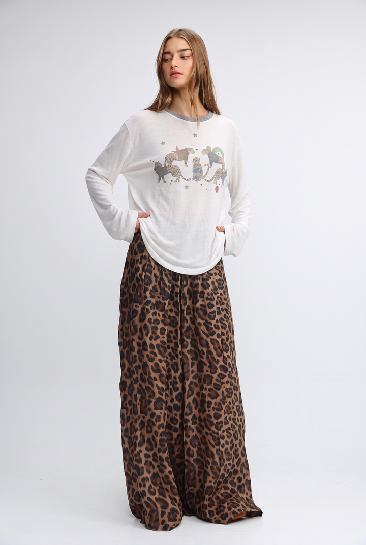 White long-sleeved jungle cream shirt with gray trim and whimsical animal print on front view