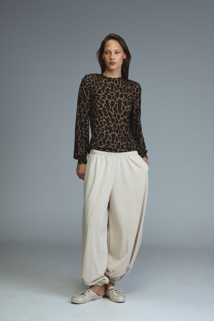 Lg leopard padded shirt is a sheer leopard-print long-sleeved top with round neckline and elastic cuffs shown front view